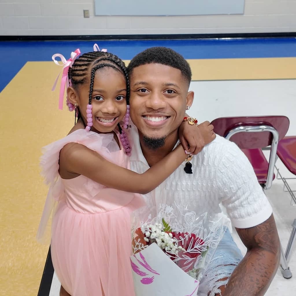 Dontez Akram with his daughter