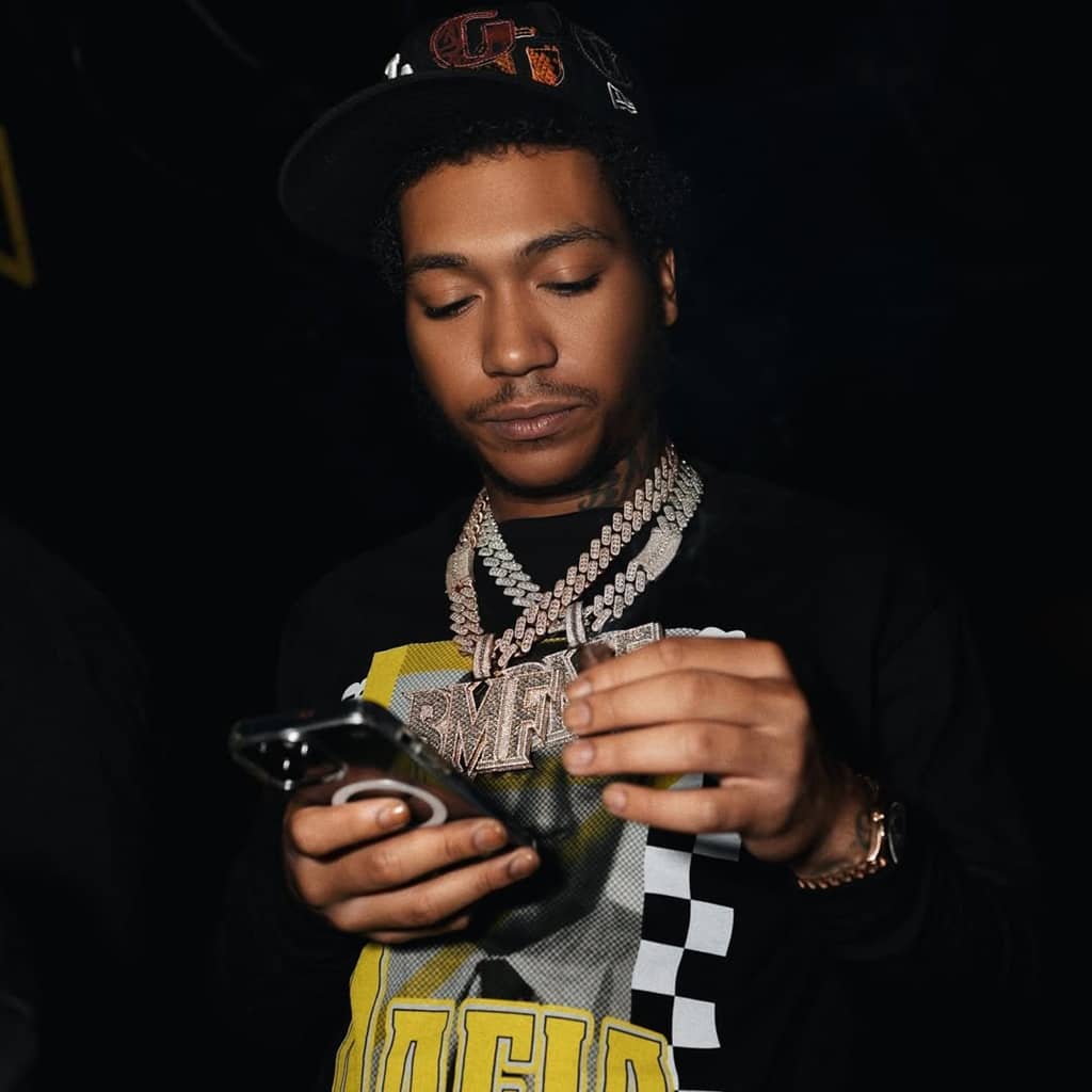 Lil Meech with phone