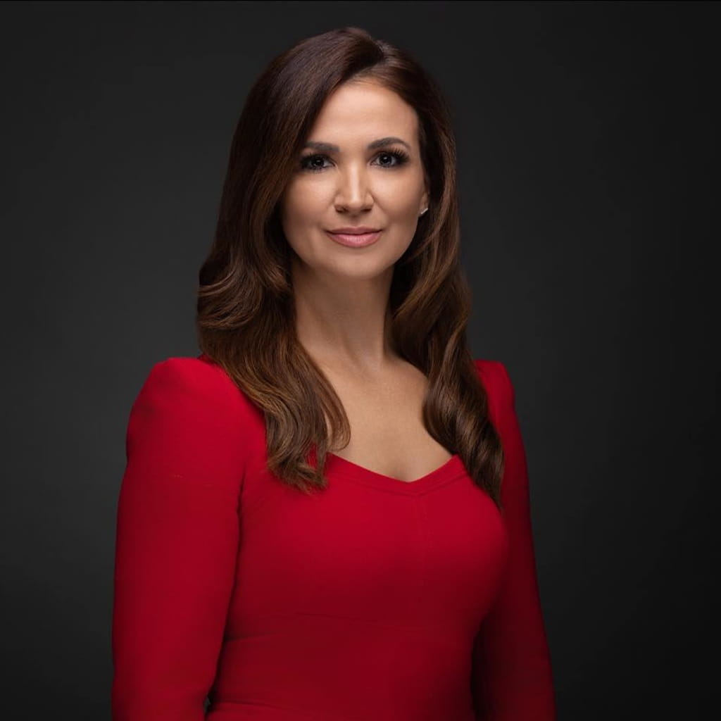 Rebeccah Heinrichs in red dress
