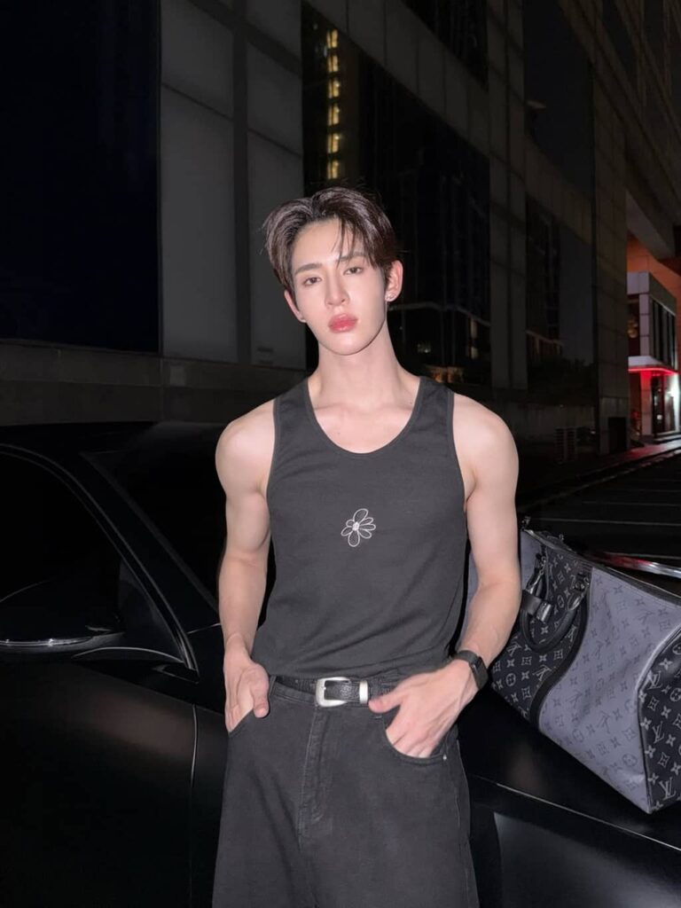 James Supamongkon Wongwisut with black dress