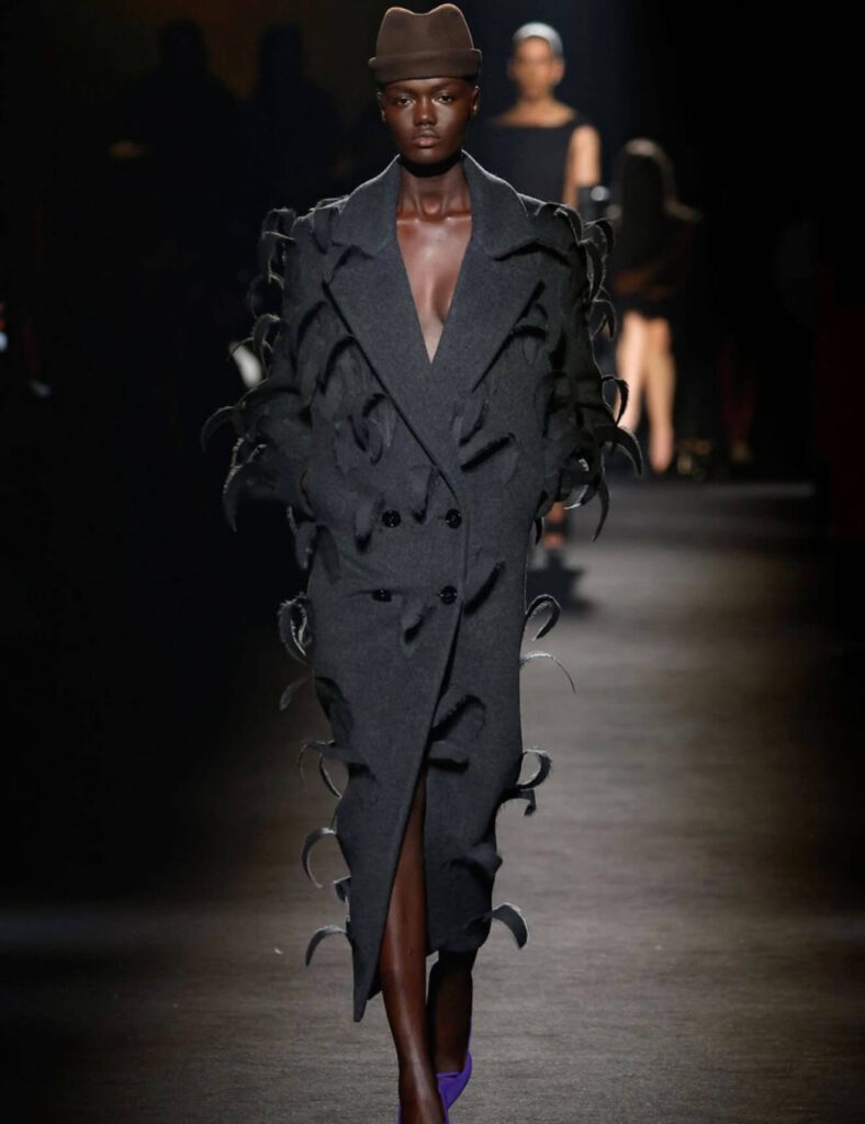 Achol Kuir doing runway show