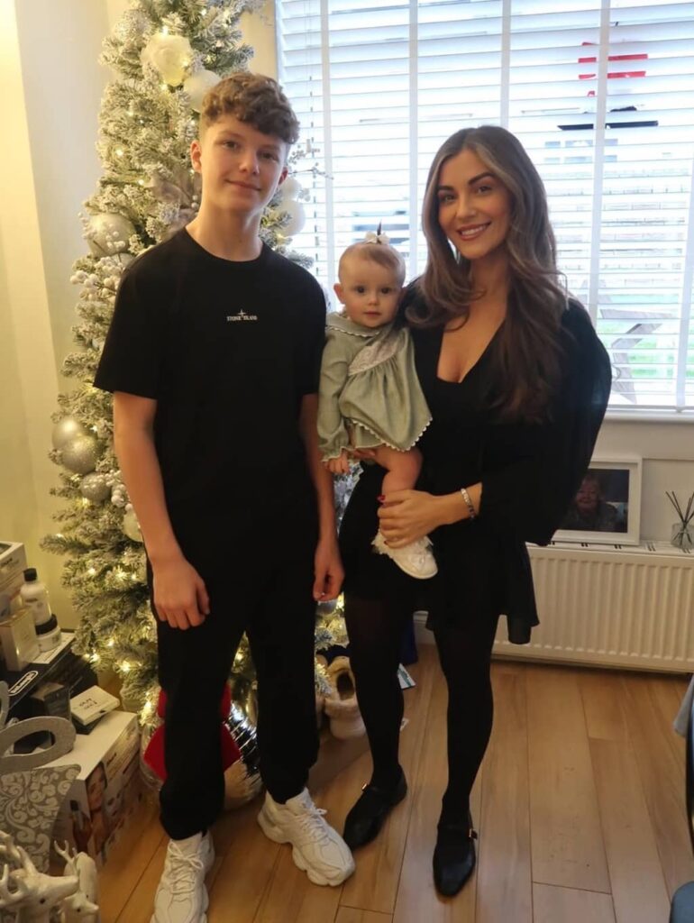 Kerri Roma with her son and daughter