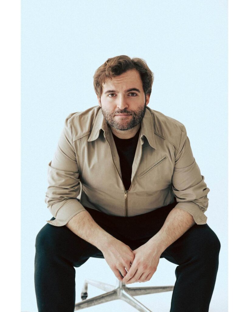 Matt Wood Sitting on Chair