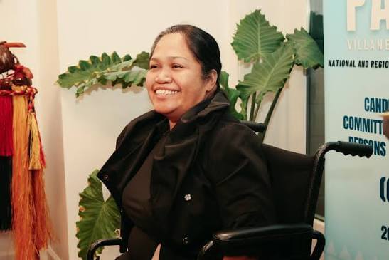 Villaney Remengesau sitting on wheelchair