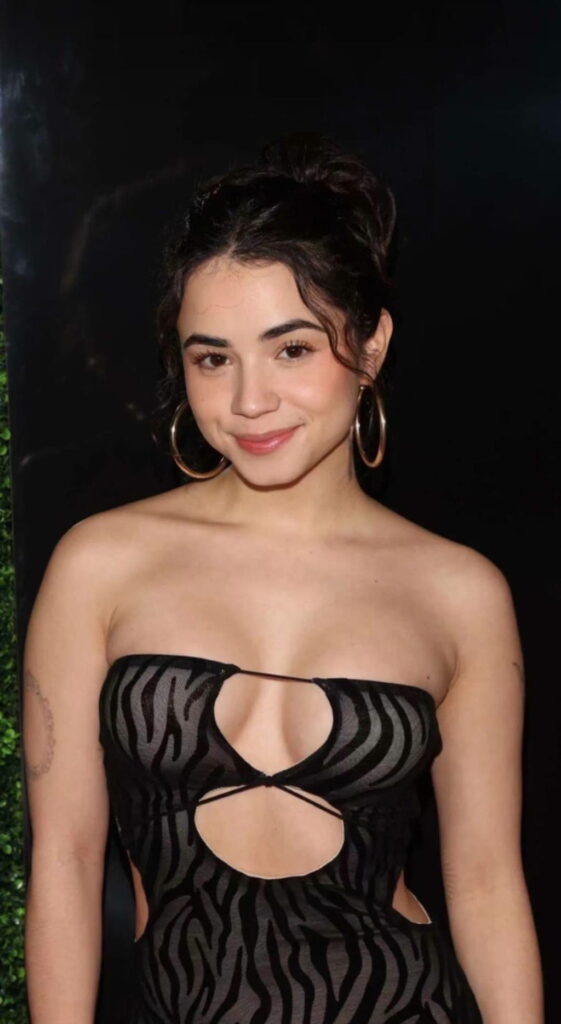 Jameliz Smith in black dress