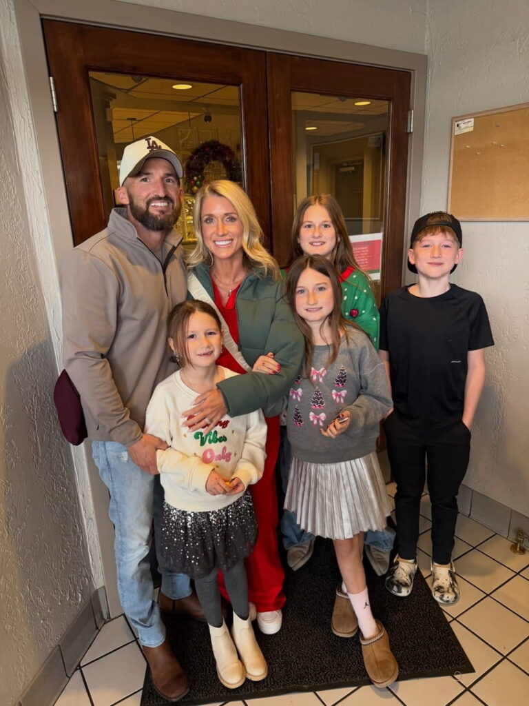 Kalee Rogers with her husband and children