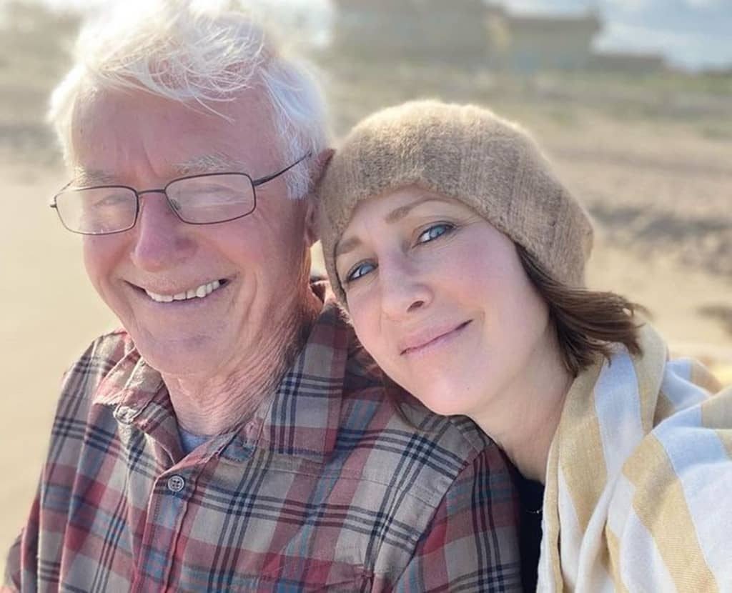 Mykhailo Farmiga with his daughter
