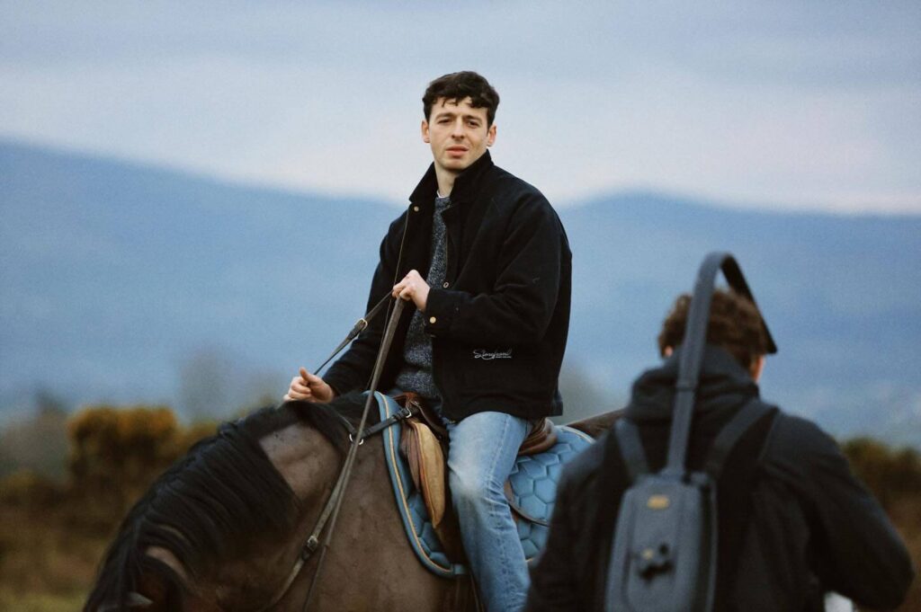 Anthony Boyle riding a horse