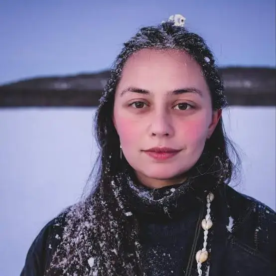 India Logan-Riley in snow fall