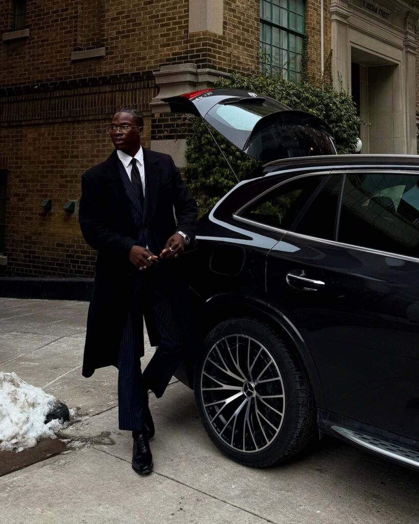 Theophilus Taiw Aladejebi with luxurious car