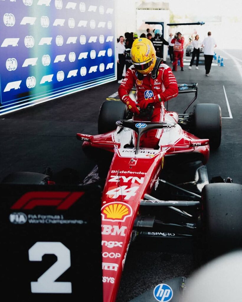 Lewis Hamilton driving car