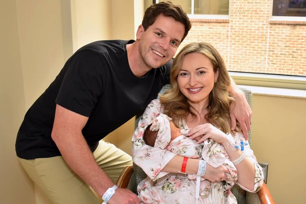 Destiny Quinn with her husband and baby