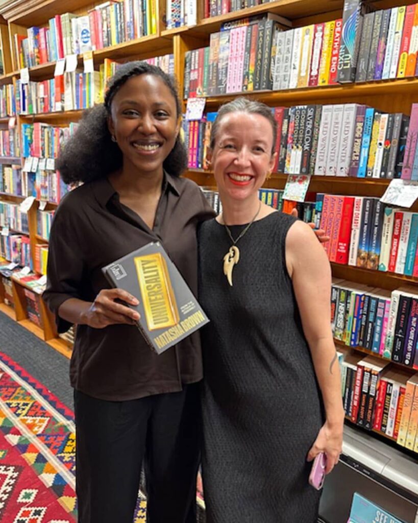 Natasha Brown with her book
