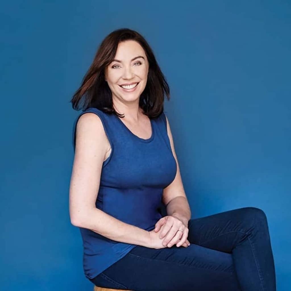Stephanie Courtney on chair