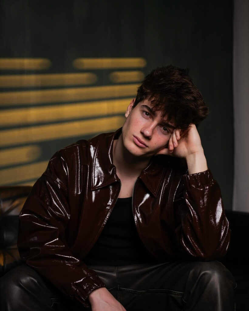 Biel Antón sitting on sofa