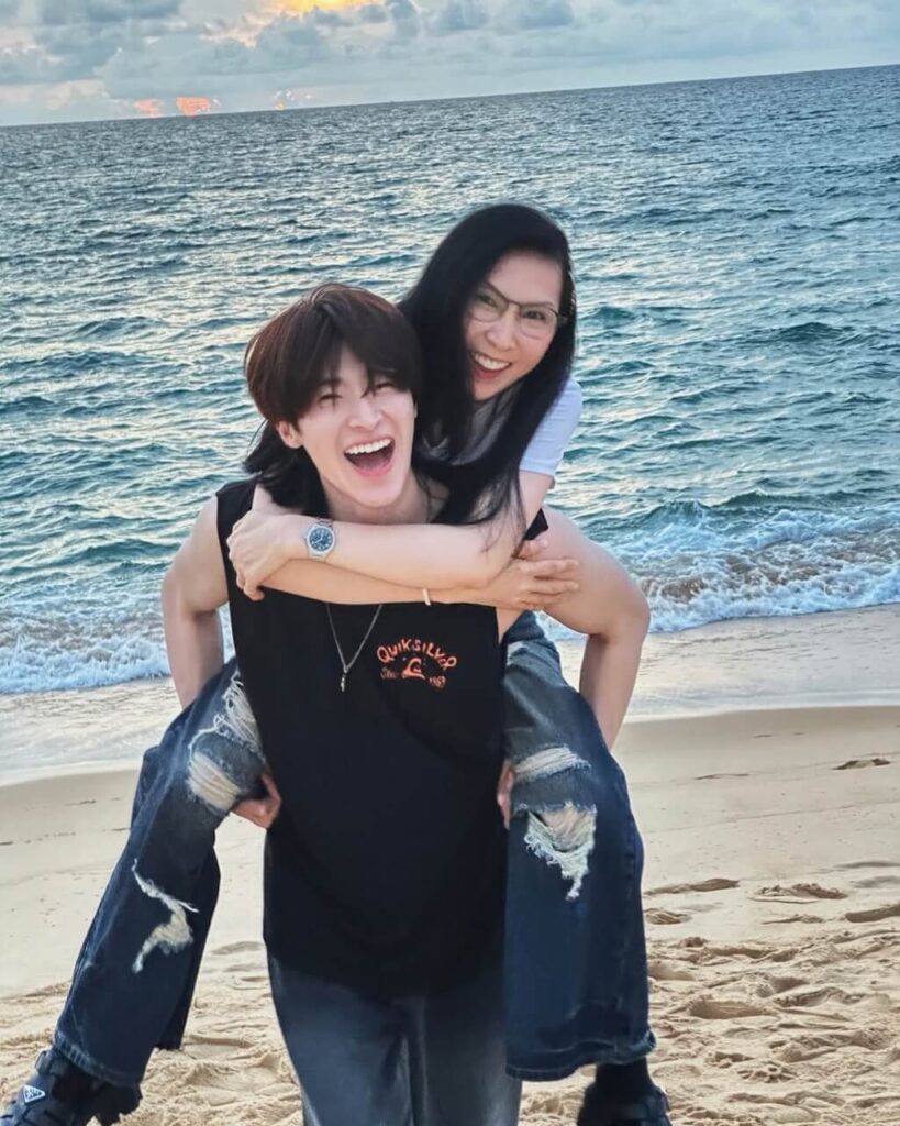 Blue Pongtiwat with his mother
