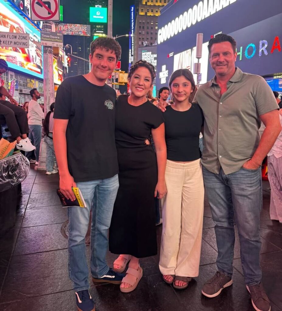 Nancy Alvarez with her husband & daughter