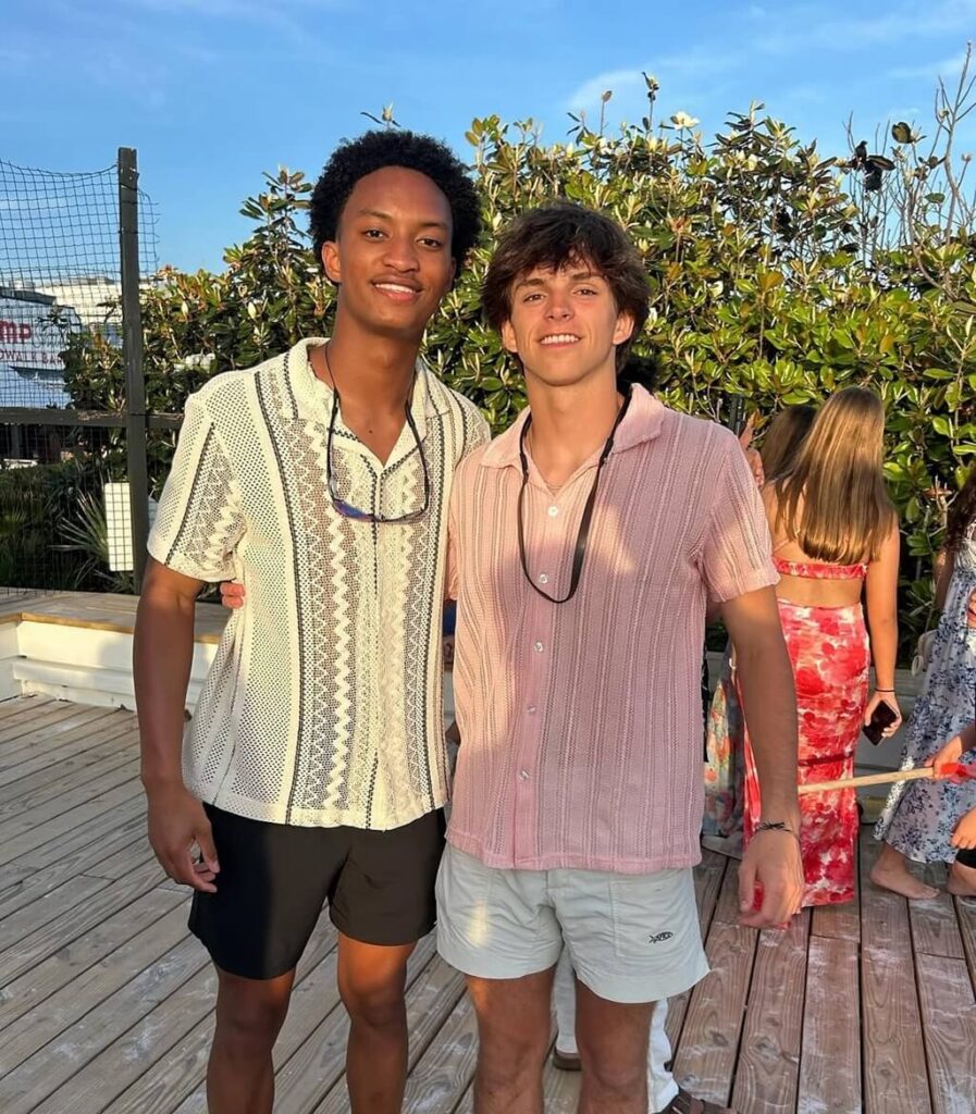 nolan wells with his friend