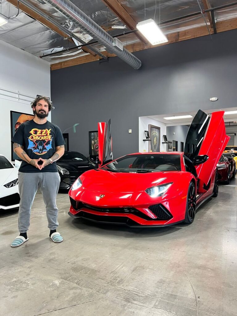 adonis bjornson with his lamborghini